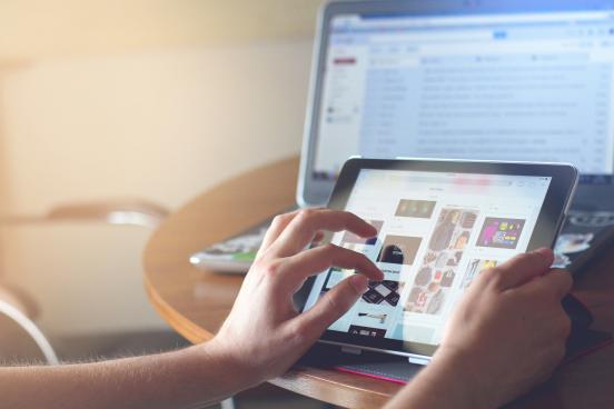 person looking at tablet